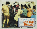 Pster promocional do musical Bye Bye Birdie. Aparece em primeiro plano o ator que representa Birdie, e depois vrios jovens, representando seus fs. Acompanha quadro com informaes sobre a pea.  Palavras-chave: Elvis Presley, celebridades, pea, msica, anos 60.