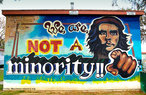 Foto do painel "Ns no somos uma minoria", pintado em 1978 e localizado em San Diego, Estados Unidos. O desenho mostra Che Guevara em gesto que lembra o do "Tio Sam".   Palavras-chave: minorias, maiorias, latinos, resistncia, chicanos, pintura, desenho.