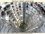 Foto de um estacionamento totalmente robotizado, contendo dezenas de carros. Palavras-chave: Carro. Robô. Tecnologia. Prédio. Transporte. Solução. Cidade. Futuro. 