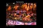 Foto de uma tpica loja de fiambres espanhola. Al podem ser encontrados diversos produtos, entre eles os famosos Jamn Serrano e Ibrico. Palavras-chave: Jamn. Presunto. Comida. Campo lxico. Campo semntico. Fiambrera. Comrcio.